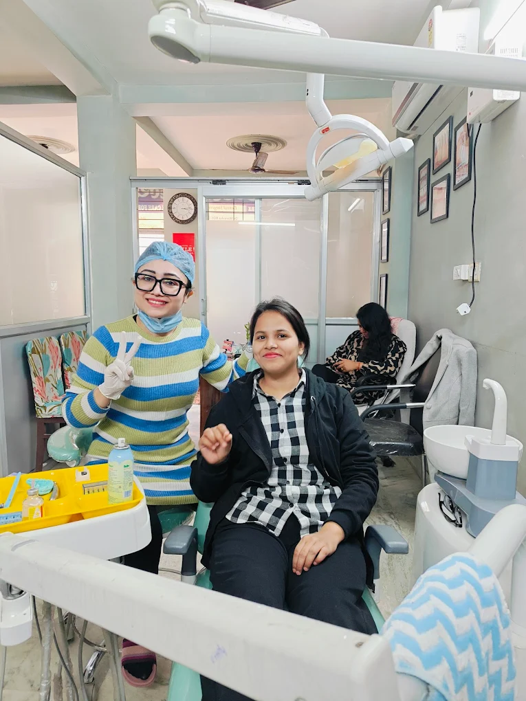 Dr. Manisha Pandey with a happy patient at Bharti Dental And Health Care Centre, Magistrate Colony, Patna